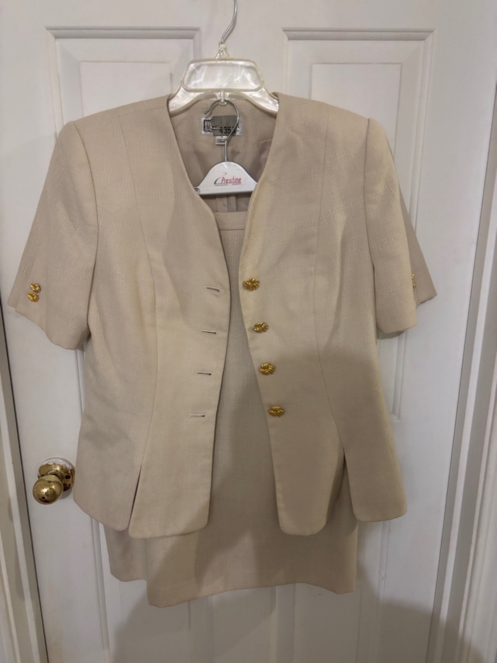 Classic Cream Two-Piece Skirt Set with Gold Buttons